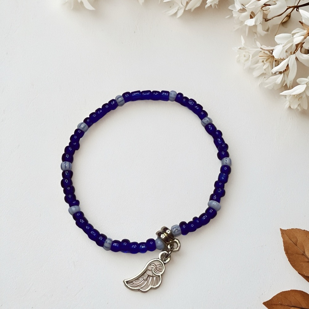 Cobalt Blue Beaded Bracelet with Pink Wing Charm - Picture 3 of 6